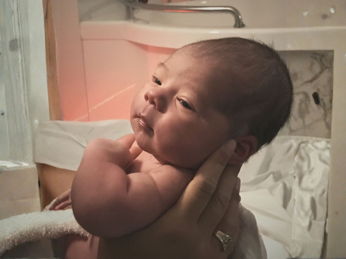 Dustin’s Fast Arrival: A TENS & Water Birth Story